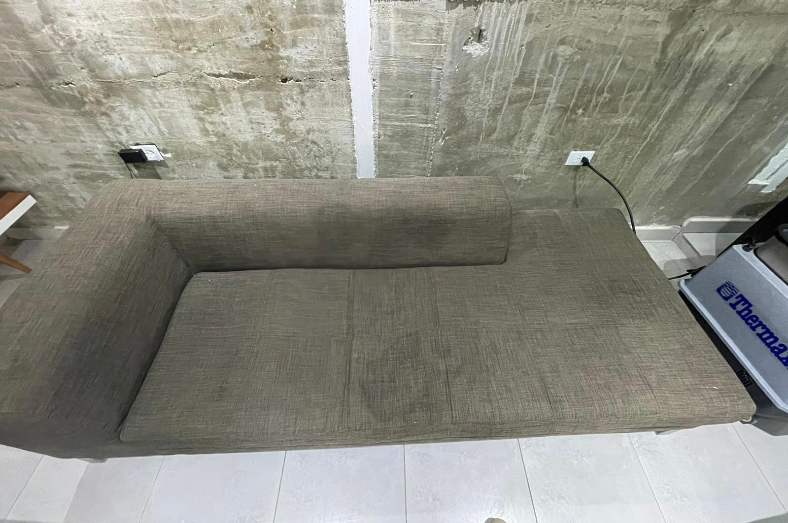 sofa antes de la limpieza de sofa